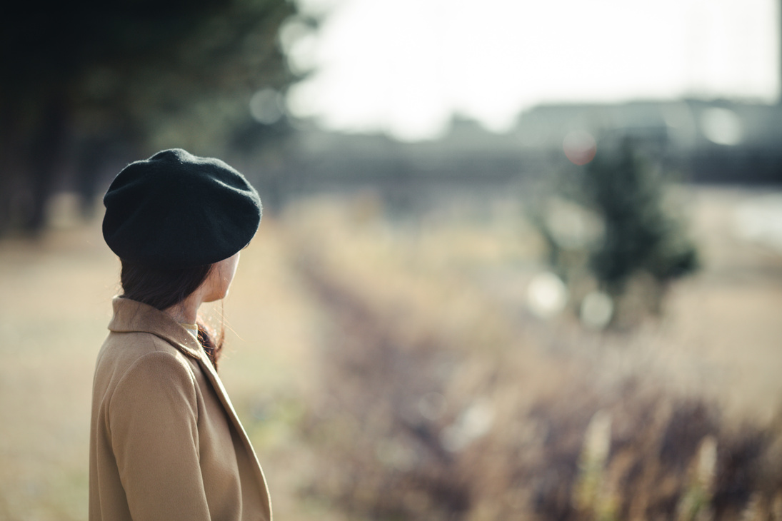 Winter and the woman from behind